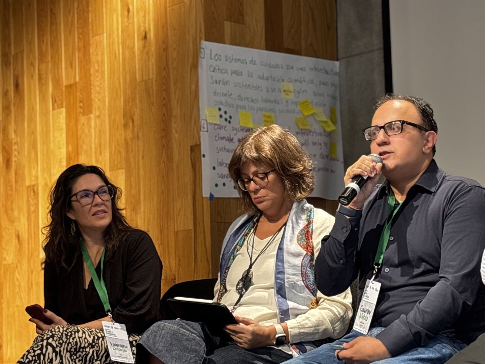 Gaurav Mehta speaking on a panel at the Climate and Care Gathering in Mexico City.